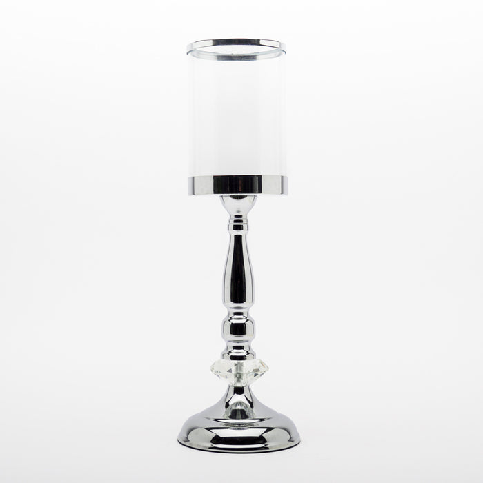 Portacandela Argento in metallo 13X45CM. Elegante accessorio dotato di supporto per candela. Adornato da una sfera di cristallo e caratterizzato da una base di supporto dalla forma larga per garantire maggiore stabilità. In vendita sullo shop di Silani