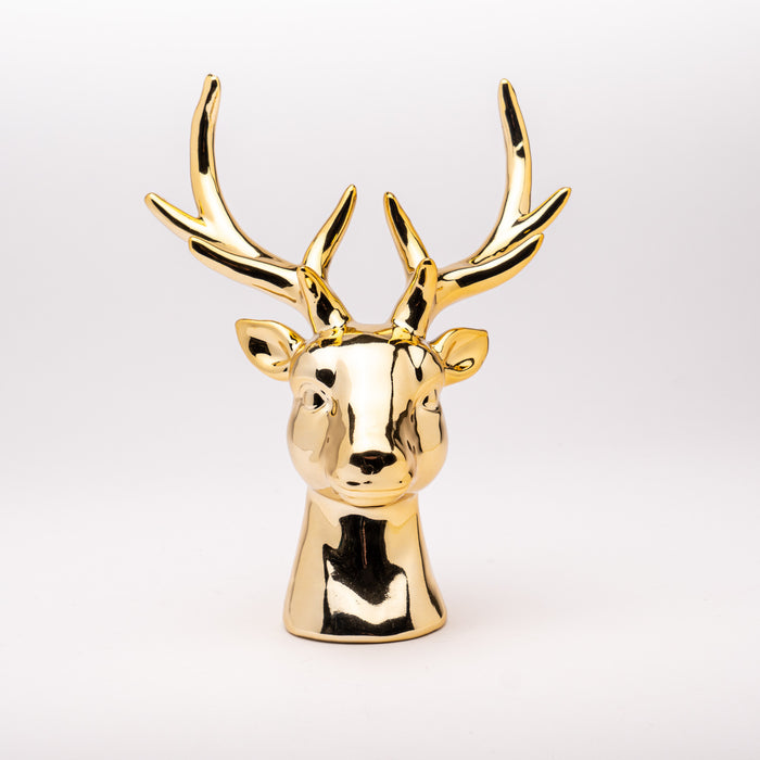 Decorazione a forma di testa di renna di colore oro realizzata in poliresina 16X10X18CM. Perfetta per dare vitalità a decorazioni Natalizie, allestimenti per locali e ad ambienti casalinghi. Può essere una stupenda idea regalo. Scopri i nostri articoli su Silani Srl.