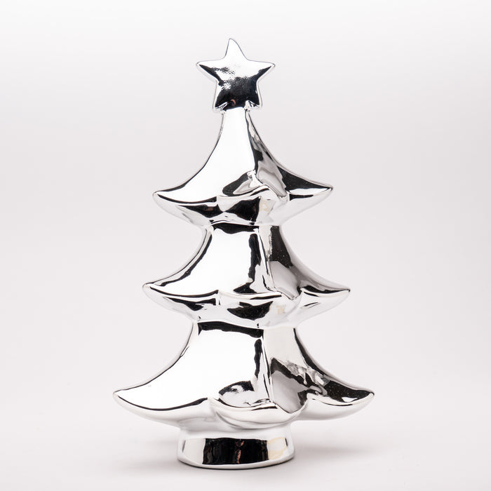 Decorazione a forma di albero di Natale di colore argento realizzata in poliresina 15X15X26CM. Perfetta per dare vitalità a decorazioni Natalizie, allestimenti per locali e ad ambienti casalinghi. Può essere una stupenda idea regalo. Scopri i nostri articoli su Silani Srl.