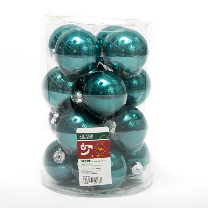 Palline in vetro per albero di Natale colore Petrolio, box da 16 sfere di dimensioni 8CM. Perfette anche per decorare ghirlande e festoni, giocando con le tonalità di colore. Confezionate in box di plastica trasparente. In vendita sullo shop di Silani