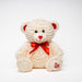 Peluche Orso Loving a pelo lungo di colore crema, pensiero perfetto da regalare per festeggiare il San Valentino, dotato di fiocco rosso e due cuoricini sulla zampetta. Peluche per San Valentino, idea regalo per feste di compleanno ed eventi a tema. Scopri i nostri articoli su Silani Srl.